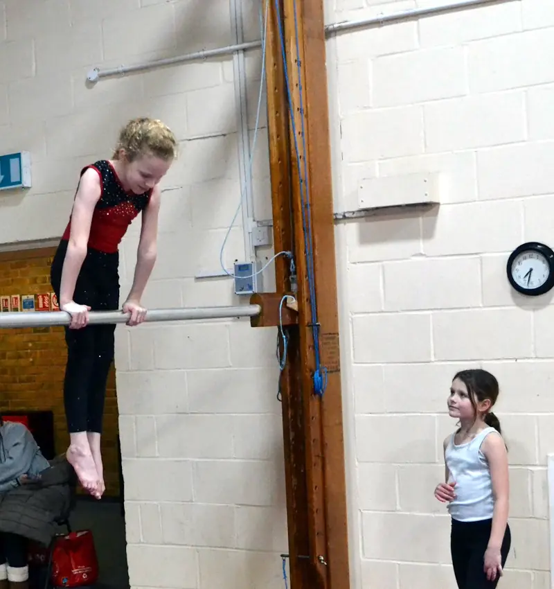 gymnast on bar